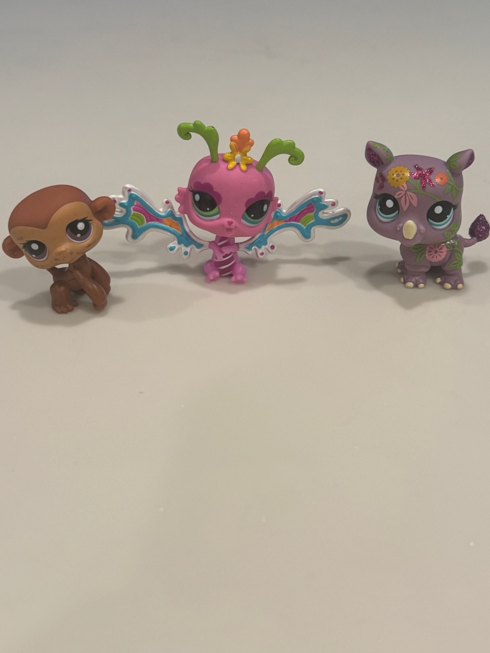 Three Littlest Pet Shop Figures Monkey Pink Fairy Rhino